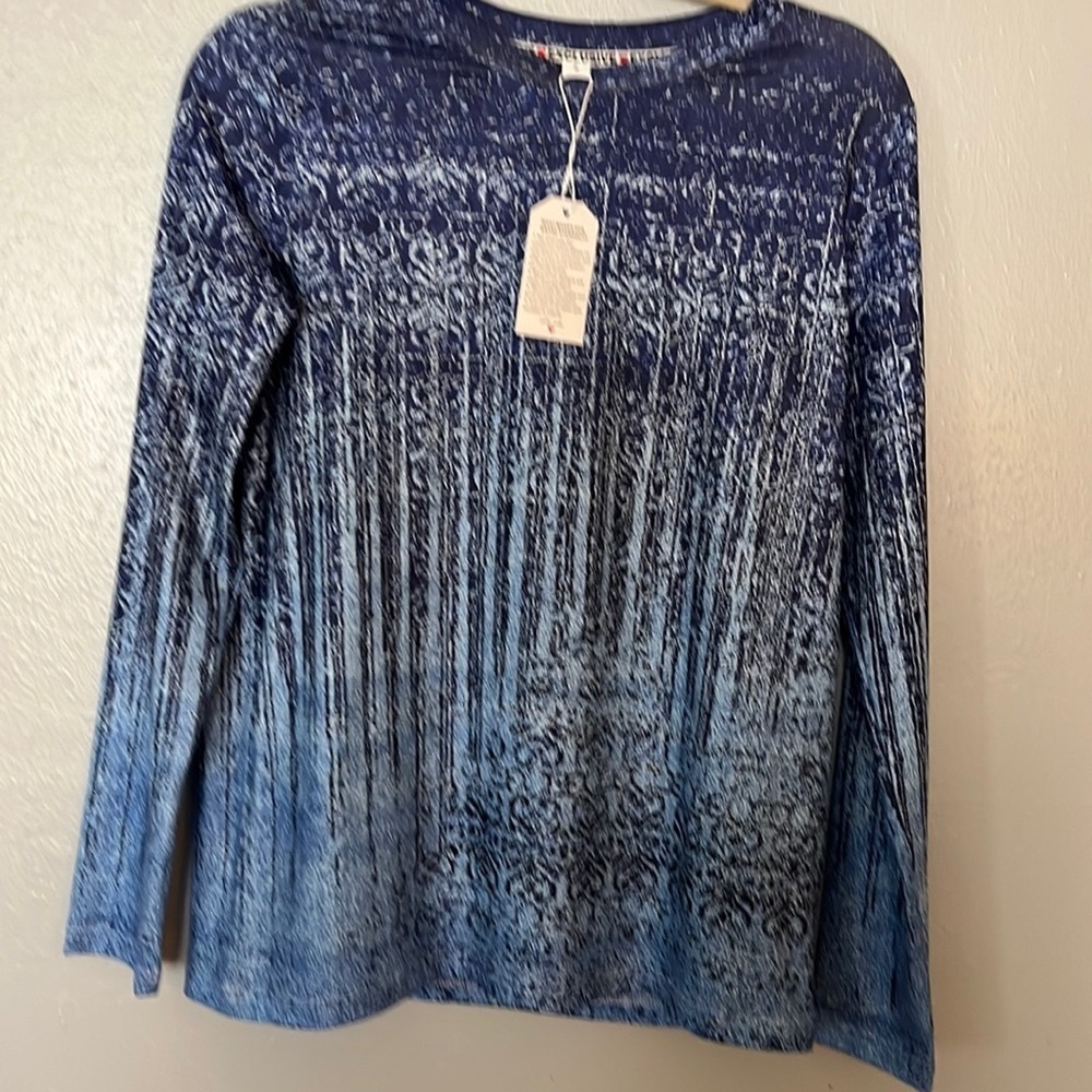 Exclusive long sleeved top. Brand new with tags. Size Small